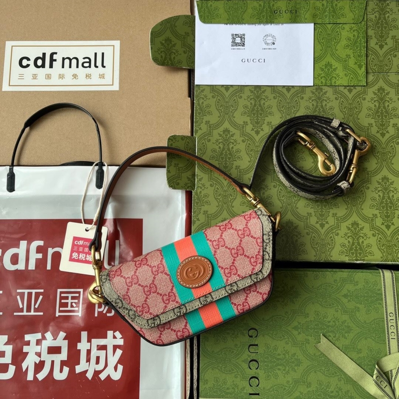 G*u*i top handle bags